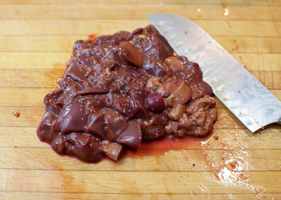 chicken liver rough chopped on cutting board