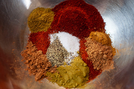 mounds of spices in mixing bowl