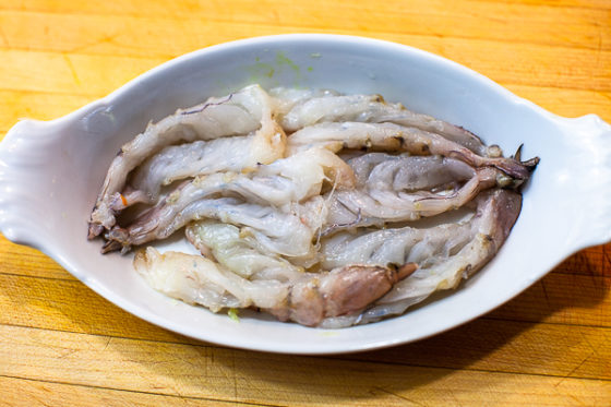 butterflied shrimp packed in white dish
