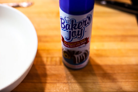 can of Baker's Joy on wooden cutting board