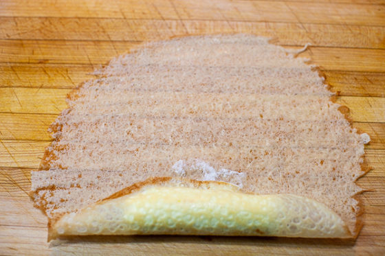 rolling crepe over filling