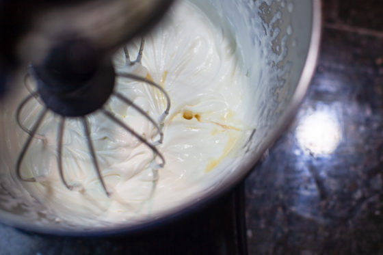 cream being whipped in stand mixer