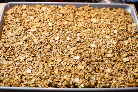toasted granola spread to edges of sheetpan