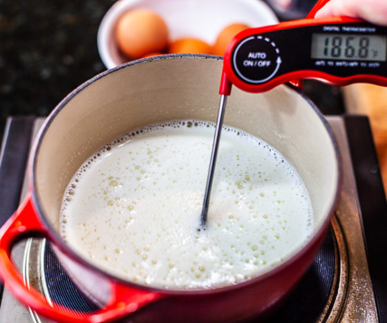 Pot of ice cream custard with thermometer reading 185