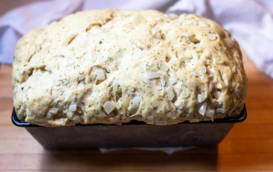 Fully risen Swedish Dill bread dough in metal pan